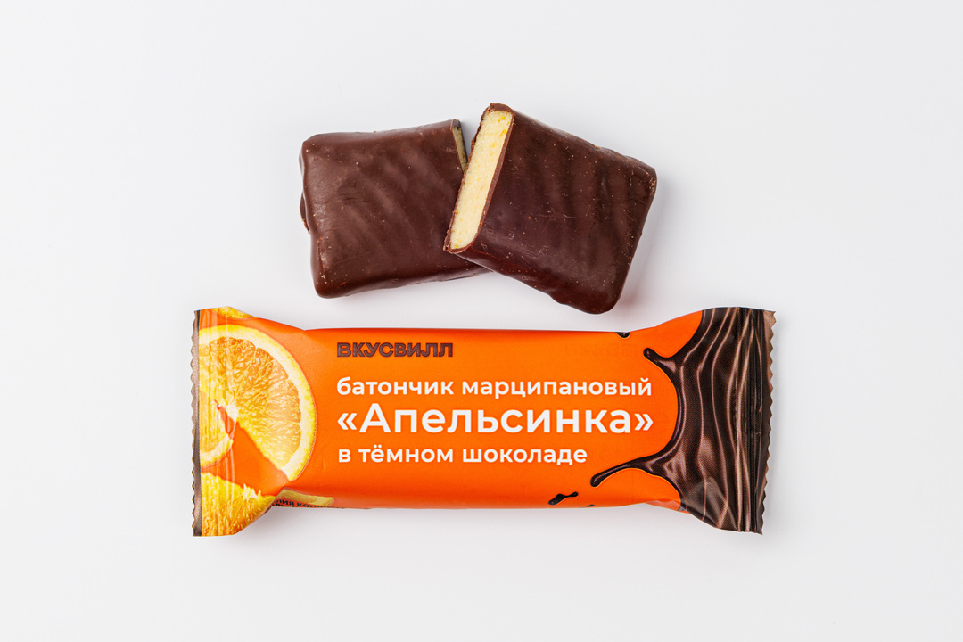 Батончик марципановый "Апельсинка" в тем.шоколаде — фото 1